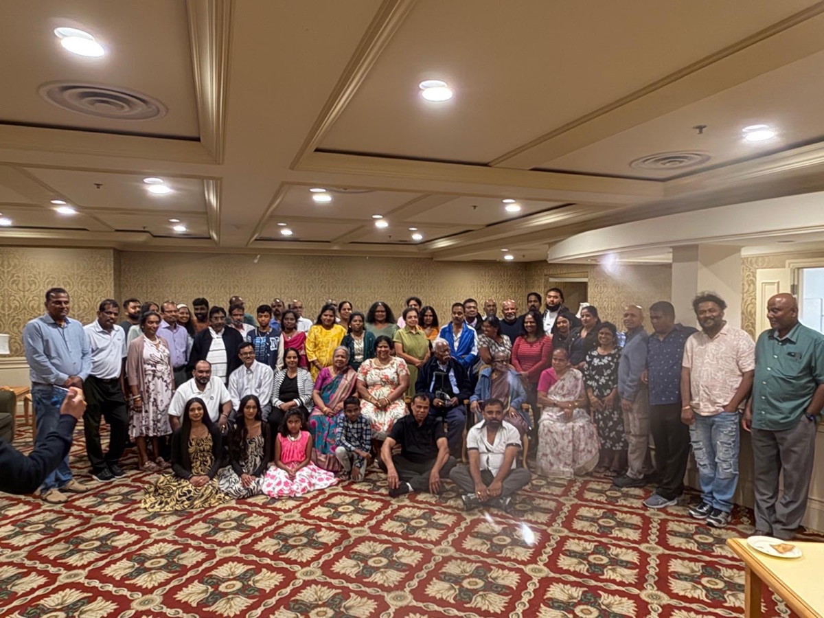 Urumpirai families gathered together at a community event in Canada